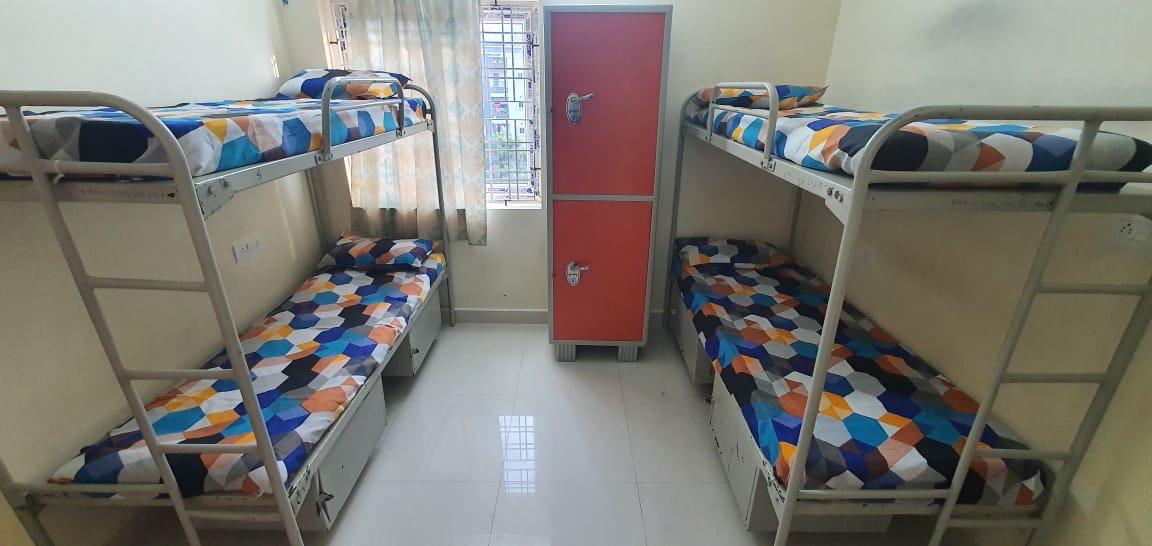 Clean Tikaana shared accommodation room with bunk beds